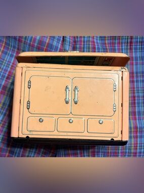 Vintage 1950s Cragstan tin litho toy kitchenette — rotating 4-in-1 design